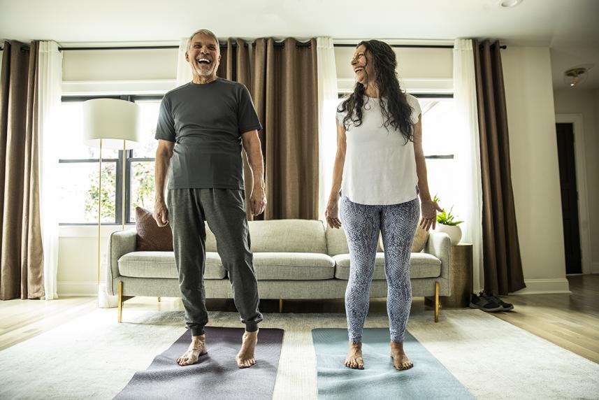 People standing on a exercise mat