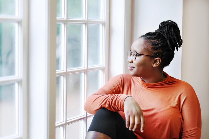 Woman looking out a window