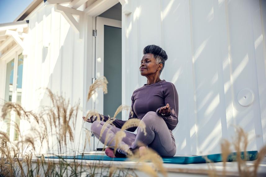 Woman meditating outside