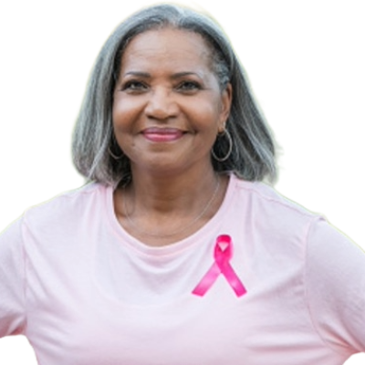 A women wearing a pink shirt and pink ribbon for Breast Cancer Awareness