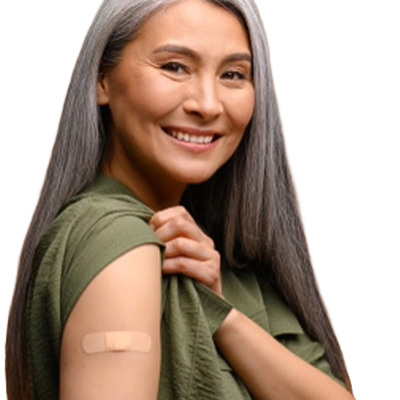 A women lifting her sleeve to review a bandaid where she recently received her flu shot. 