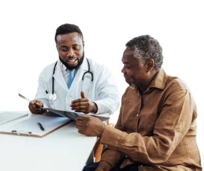 A doctor and patient sitting at a table reviewing documents