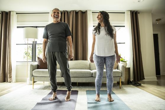 People standing on a exercise mat