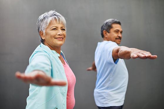 People doing yoga exercises