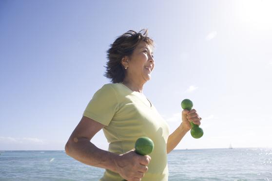Person running with dumbells