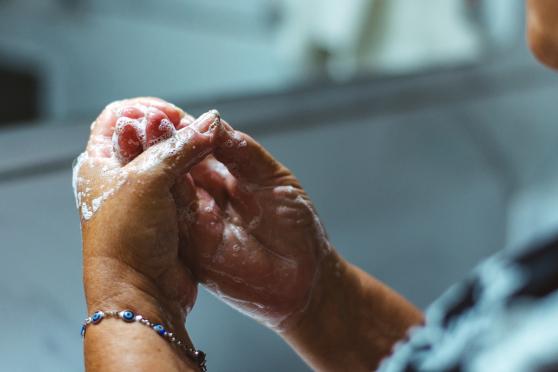 Closeup of woman washing hands